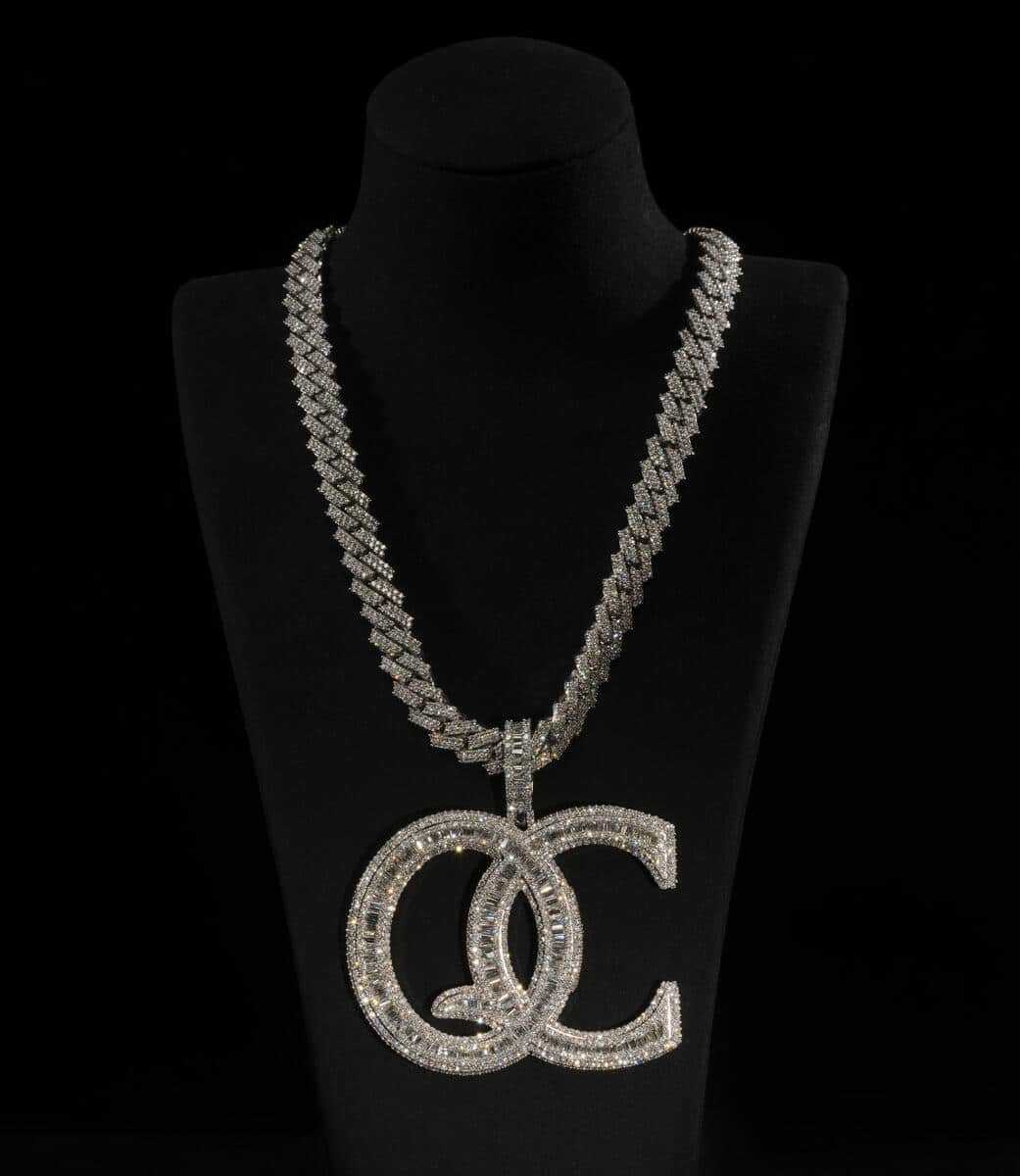 A symbol of the Atlanta-based powerhouse Quality Control Music, the QC necklace boasts stunning diamonds and 14-karat white gold and was designed by Wafi of Jewelry Unlimited in 2021.